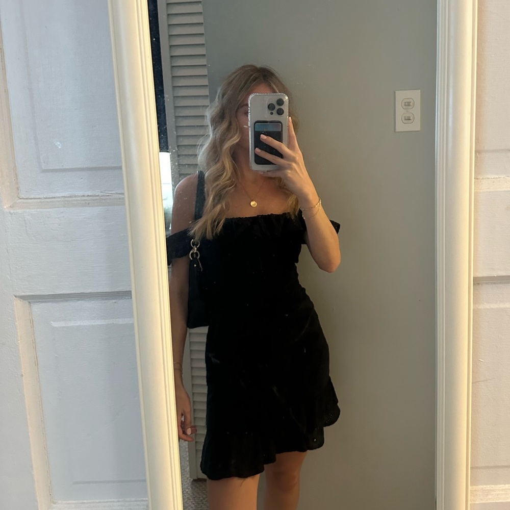 Black off the shoulder eyelet mini with ruffle detail